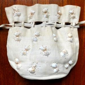 Very Unique natural fiber made pastel green sea shell pouch/purse. Never used